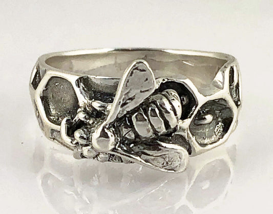 Milk Brood Bee Ring Carved in wax and cast in Sterling Silver, this Milk Brood Bee Ring has carved honeycomb cells with the Future of the Hive just starting! Baby Bee larvae look a lot like tiny grubs. Beekeepers call larvae uncapped brood or “milk brood”