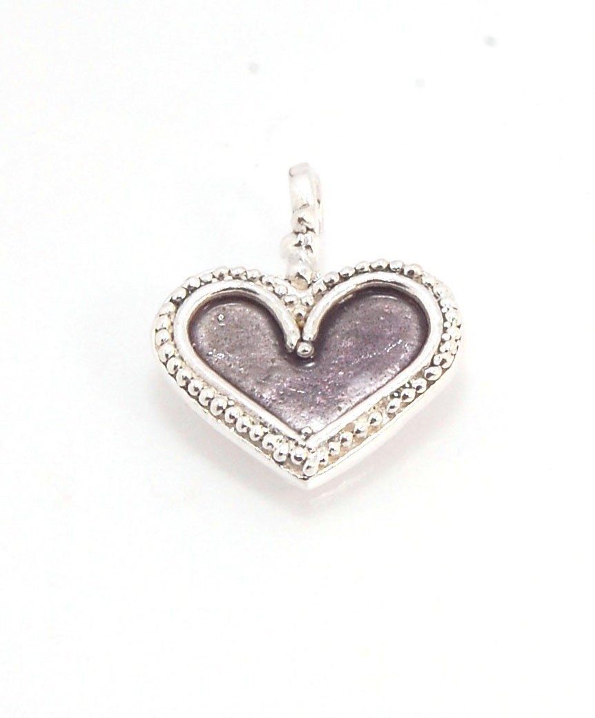 Enamel Heart Charm in Fine SIlver It’s a HEART of fine silver granulation that I made a mold of, then cast, then enameled! In your choice of colors: Red, Purple, Green, Black, Azalea, HollyhockGranulation is an ancient fusing process utilized for thousand