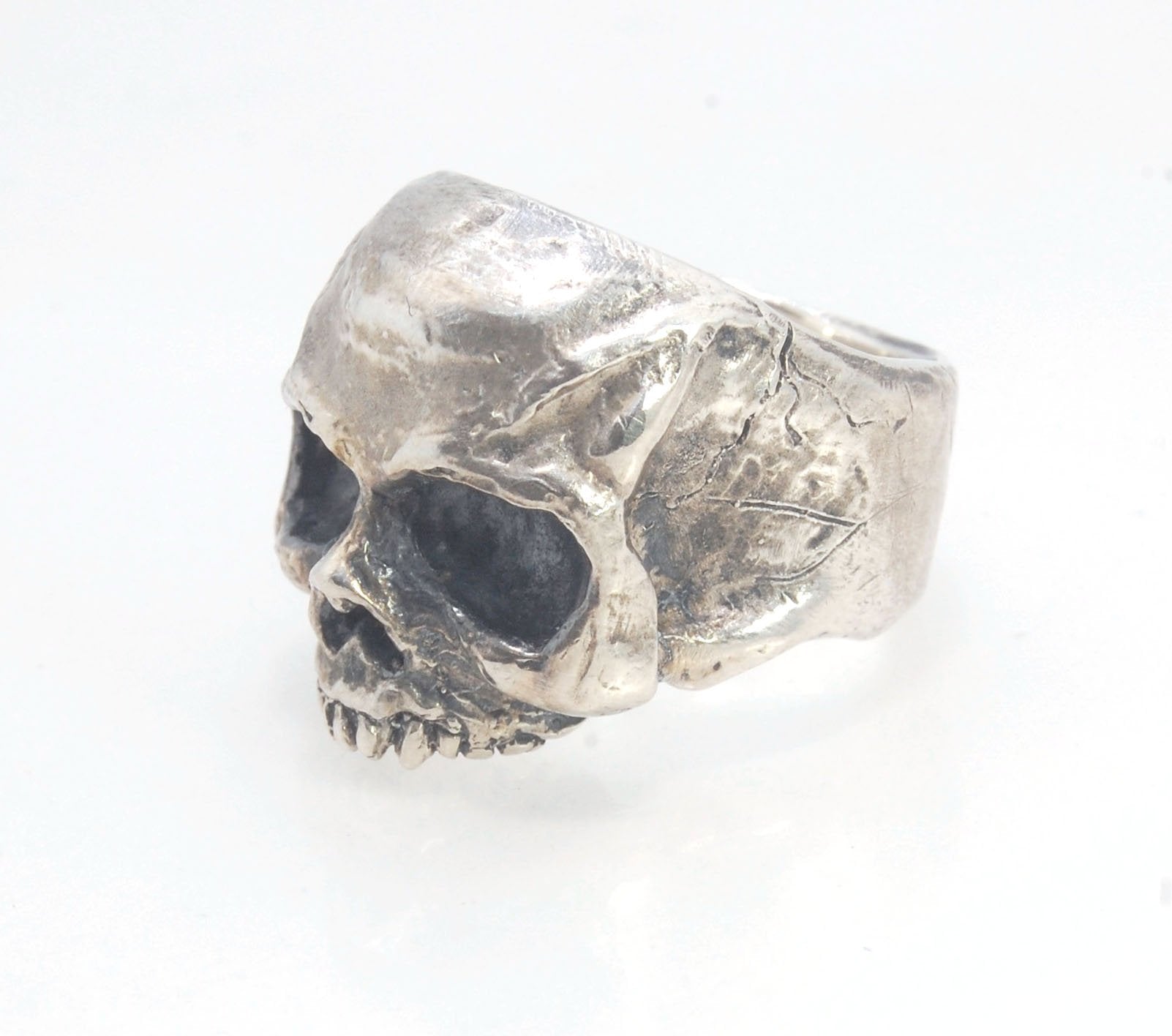 Richard II Skull Ring in Sterling This is a heavy, heavy-duty, solid skull ring that is Made to Order for you in your size. You will probably not want to play picklebalI or play the flute while wearing this heavy ring. Just saying. I carved this skull in