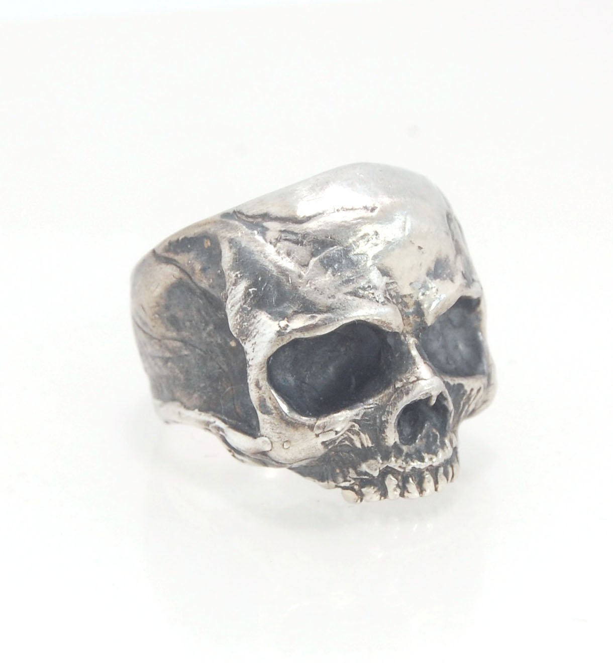 Richard II Skull Ring in Sterling This is a heavy, heavy-duty, solid skull ring that is Made to Order for you in your size. You will probably not want to play picklebalI or play the flute while wearing this heavy ring. Just saying. I carved this skull in