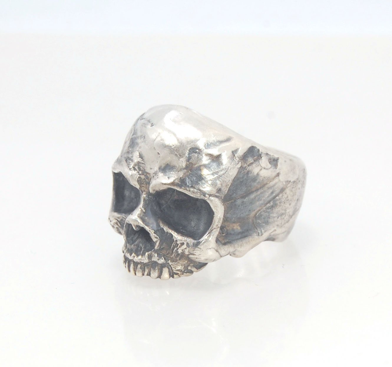 Richard II Skull Ring in Sterling This is a heavy, heavy-duty, solid skull ring that is Made to Order for you in your size. You will probably not want to play picklebalI or play the flute while wearing this heavy ring. Just saying. I carved this skull in