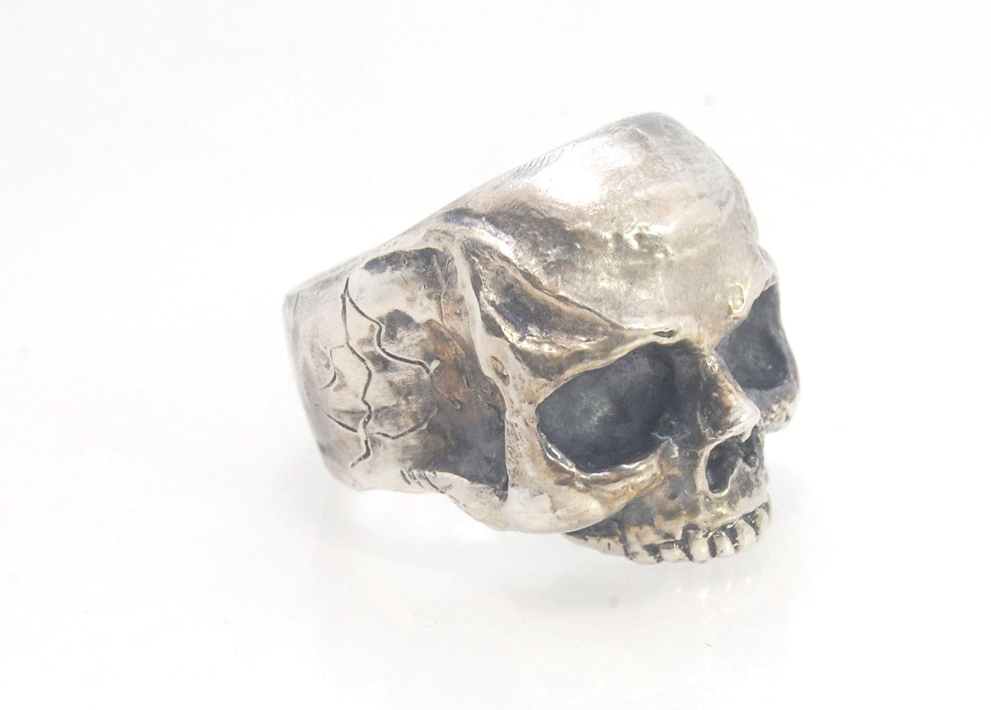 Richard II Skull Ring in Sterling This is a heavy, heavy-duty, solid skull ring that is Made to Order for you in your size. You will probably not want to play picklebalI or play the flute while wearing this heavy ring. Just saying. I carved this skull in