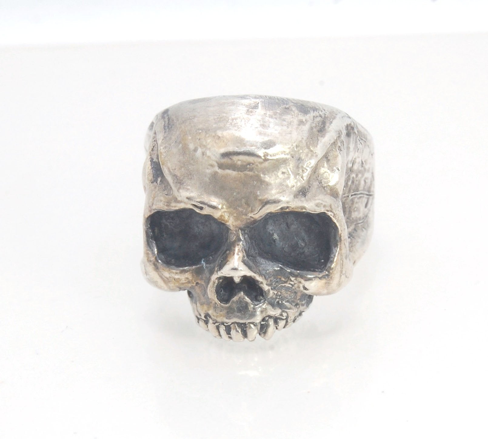 Richard II Skull Ring in Sterling This is a heavy, heavy-duty, solid skull ring that is Made to Order for you in your size. You will probably not want to play picklebalI or play the flute while wearing this heavy ring. Just saying. I carved this skull in