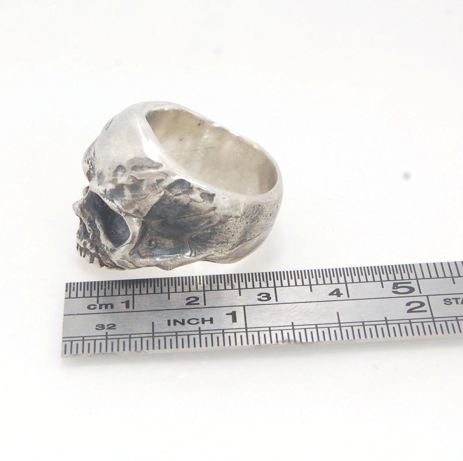 Richard II Skull Ring in Sterling This is a heavy, heavy-duty, solid skull ring that is Made to Order for you in your size. You will probably not want to play picklebalI or play the flute while wearing this heavy ring. Just saying. I carved this skull in