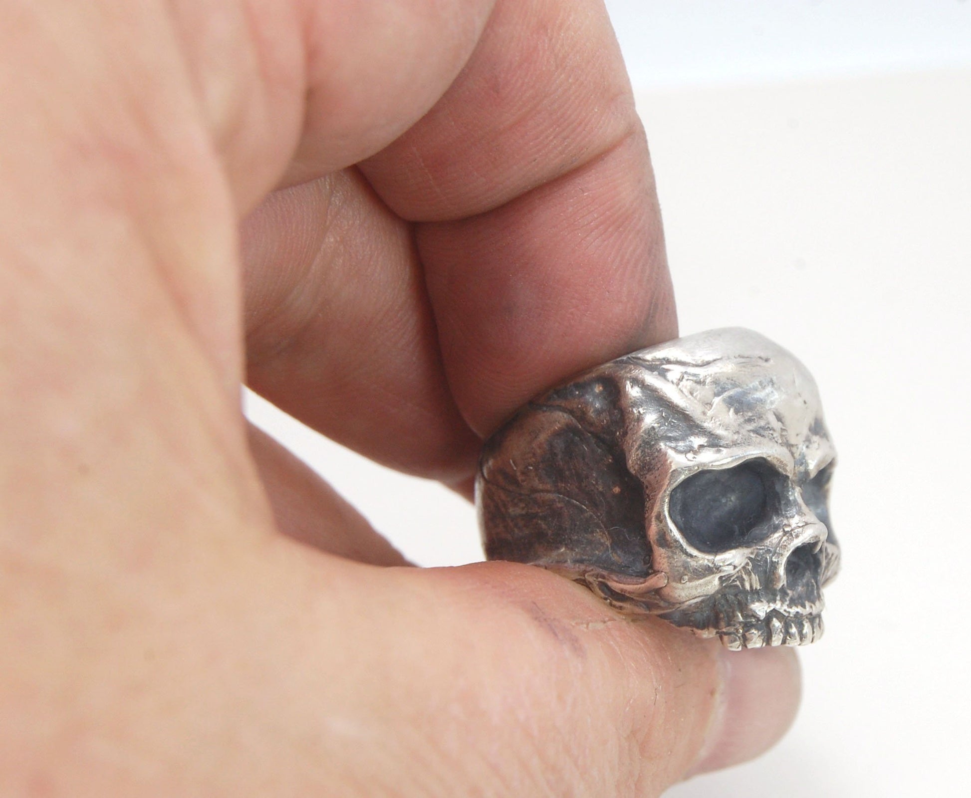 Richard II Skull Ring in Sterling This is a heavy, heavy-duty, solid skull ring that is Made to Order for you in your size. You will probably not want to play picklebalI or play the flute while wearing this heavy ring. Just saying. I carved this skull in