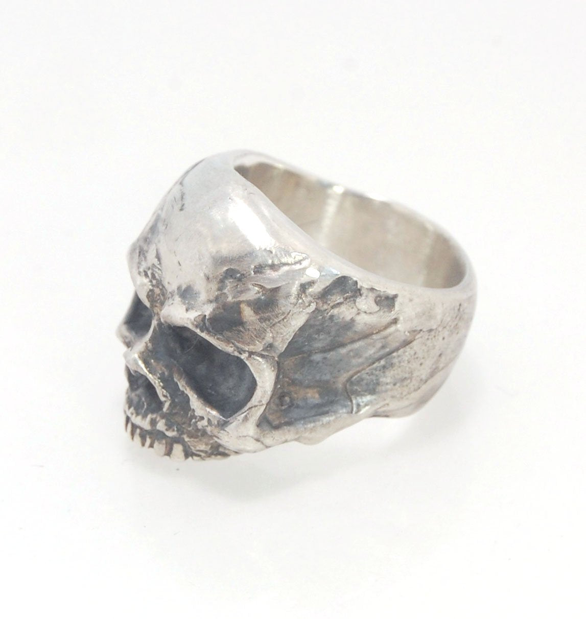 Richard II Skull Ring in Sterling This is a heavy, heavy-duty, solid skull ring that is Made to Order for you in your size. You will probably not want to play picklebalI or play the flute while wearing this heavy ring. Just saying. I carved this skull in