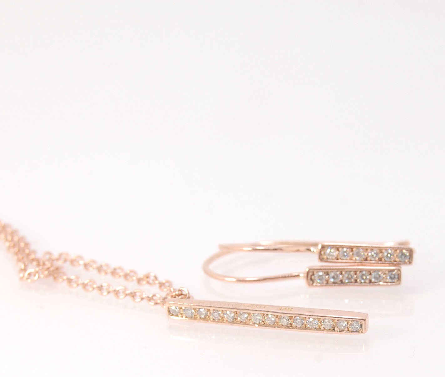 Short Tiny Diamond Earrings with french Hook and clasp - 14k Rose Gold These great little sparklers are subtle enough for every day as long as you don’t mind everyone noticing! They have 6 x 1.3mm diamonds in a single pave row. Earrings have french hook a