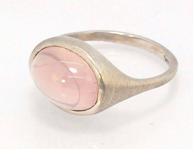 Rose Quartz Ring in Brushed Silver This is one of my first wax carved designs cast in sterling silver using a lost wax process. I start with a piece of wax and math and start carving until the ring is revealed! The back of the rIng is fully open so the ro