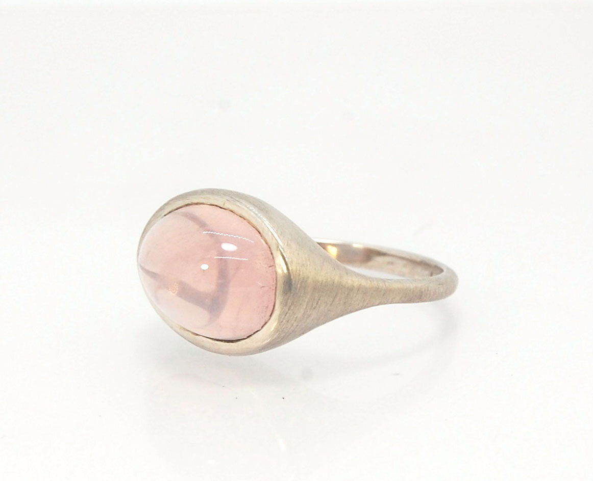 Rose Quartz Ring in Brushed Silver This is one of my first wax carved designs cast in sterling silver using a lost wax process. I start with a piece of wax and math and start carving until the ring is revealed! The back of the rIng is fully open so the ro