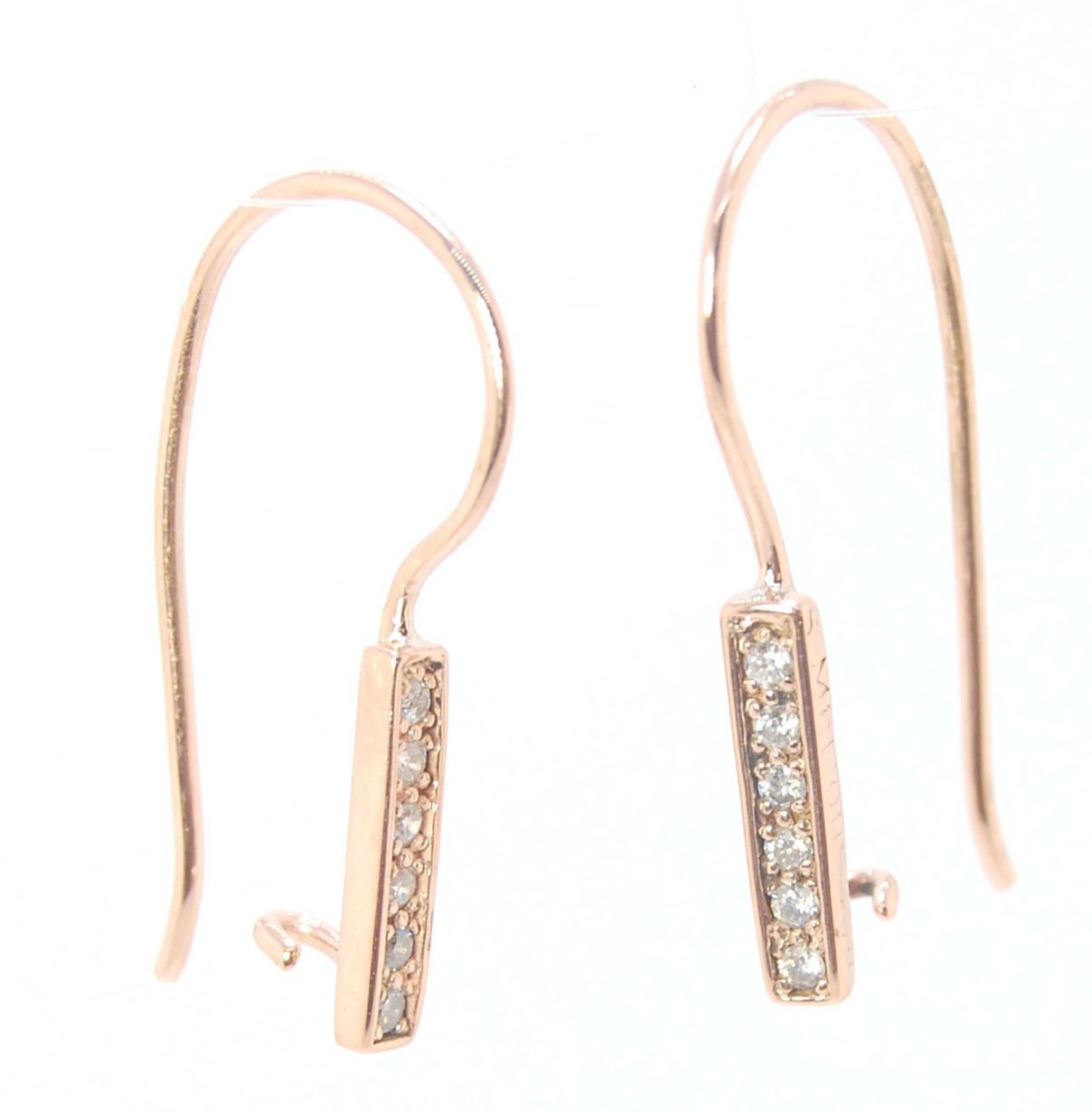 Short Tiny Diamond Earrings with french Hook and clasp - 14k Rose Gold These great little sparklers are subtle enough for every day as long as you don’t mind everyone noticing! They have 6 x 1.3mm diamonds in a single pave row. Earrings have french hook a