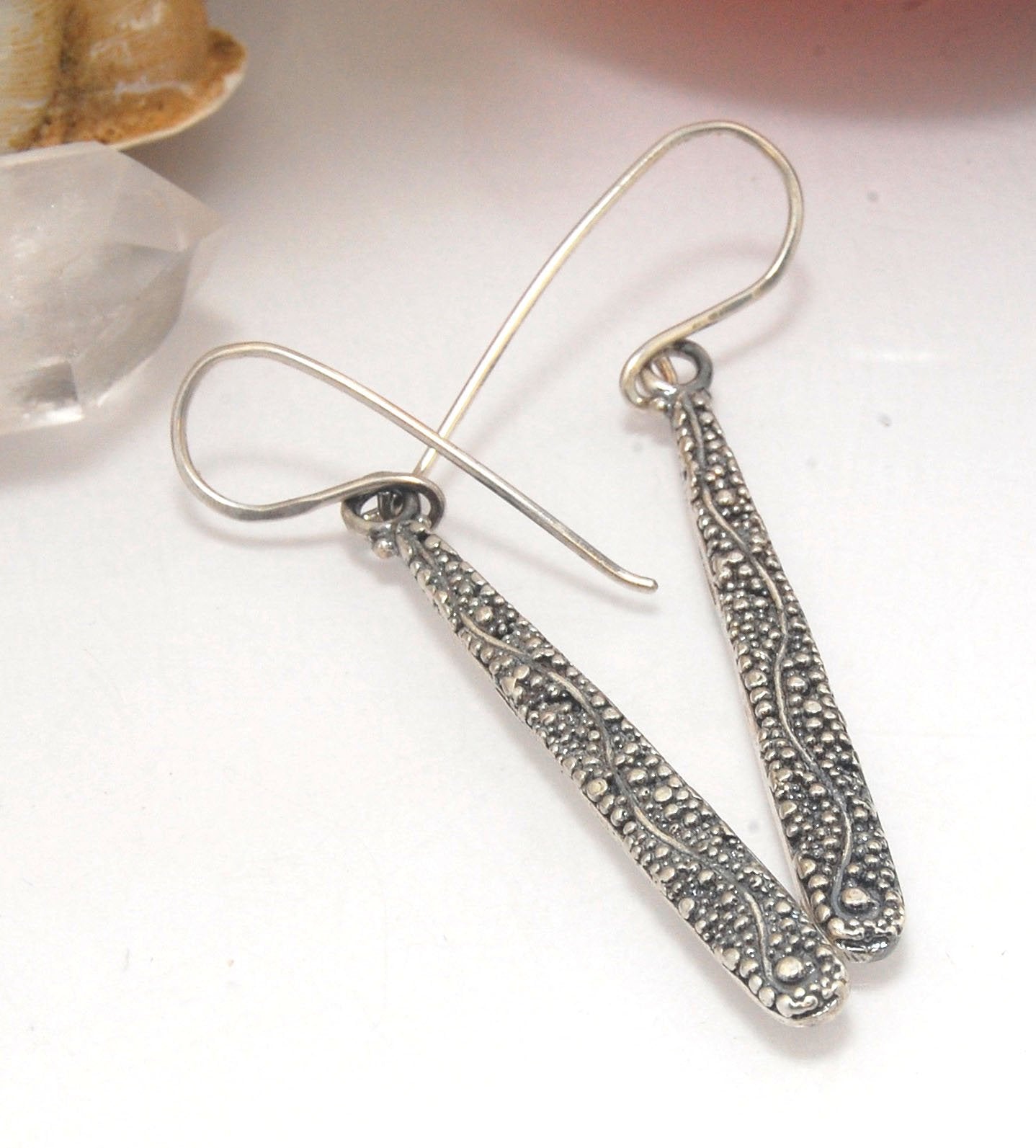 Seaweed Dangles - Long Earrings These seaweed dangle have terrific movement and sparkle. These are cast versions of my original granulation work, which is then molded for repeat waxes and cast using the ancient Lost Wax Process. Granulation is an ancient