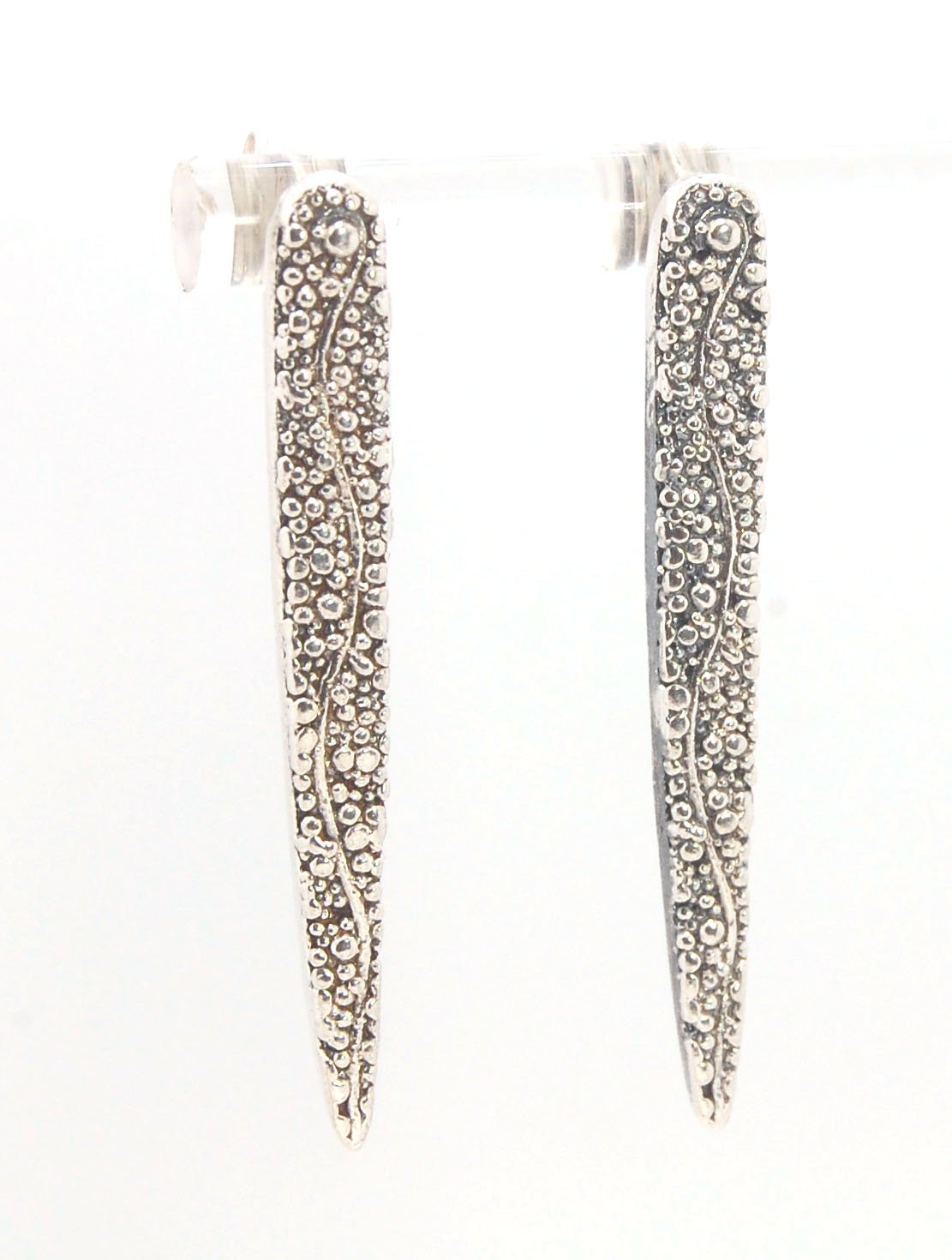 Seaweed Pattern Long Dagger Posts These seaweed dagger post earrings are long, elegant points of silver filled with a granulation pattern I call Seaweed, as it looks like it has so much movement in the varying-sized granules. These are cast versions of my