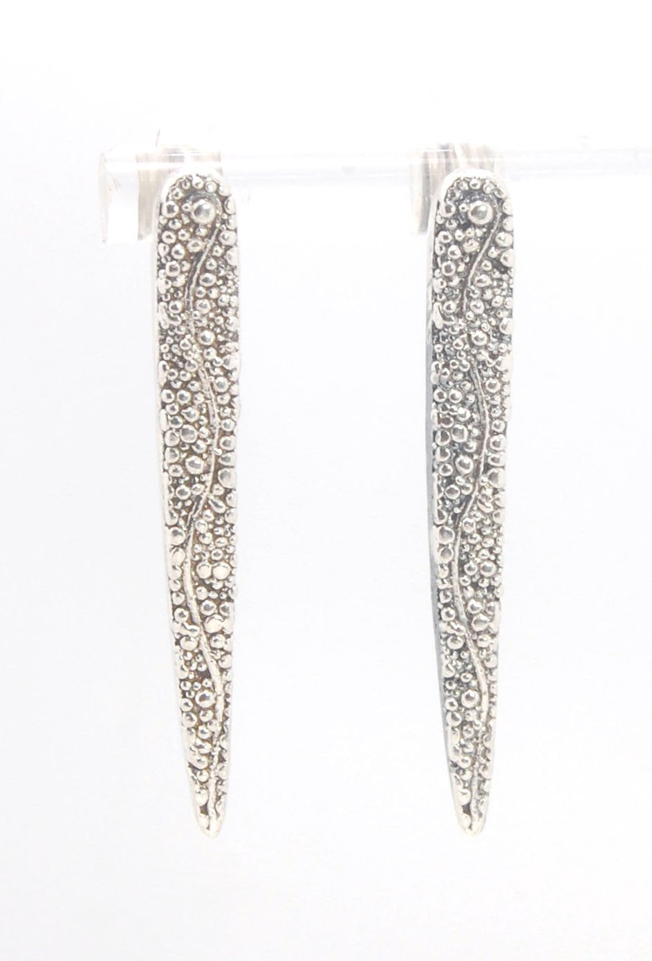 Seaweed Pattern Long Dagger Posts These seaweed dagger post earrings are long, elegant points of silver filled with a granulation pattern I call Seaweed, as it looks like it has so much movement in the varying-sized granules. These are cast versions of my