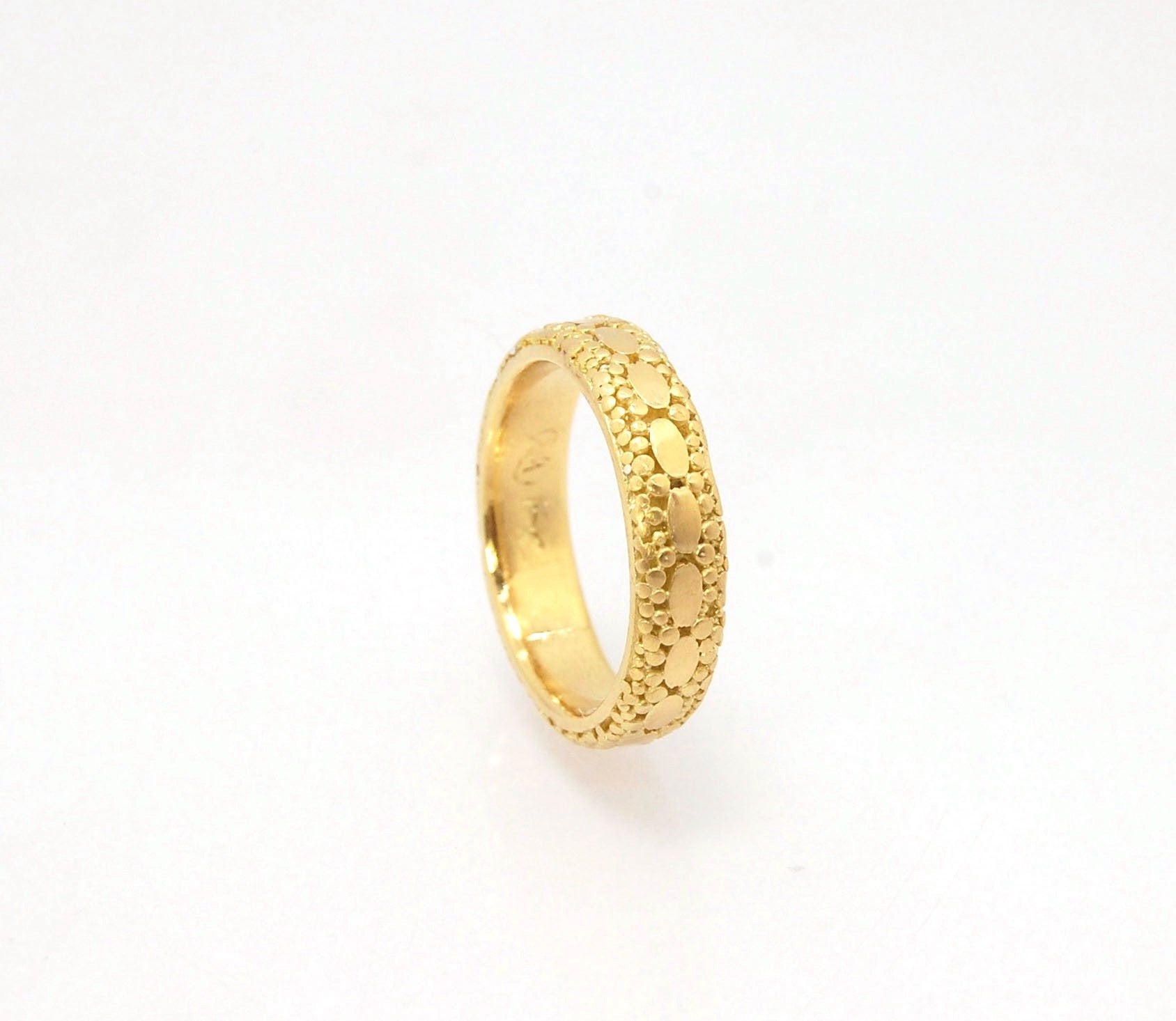 Oval Lace Granulation Ring in 18k Gold This is a stunning band I made from 18k Gold using the process of Granulation. I am happy to make one for you in your size. Each is one of a kind and handmade for you.Granulation is an ancient fusing process utilized