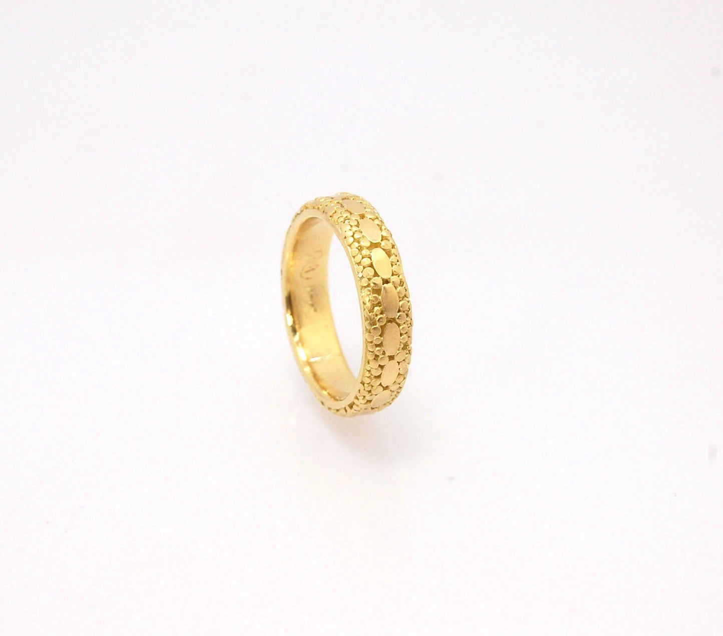 Oval Lace Granulation Ring in 18k Gold This is a stunning band I made from 18k Gold using the process of Granulation. I am happy to make one for you in your size. Each is one of a kind and handmade for you.Granulation is an ancient fusing process utilized