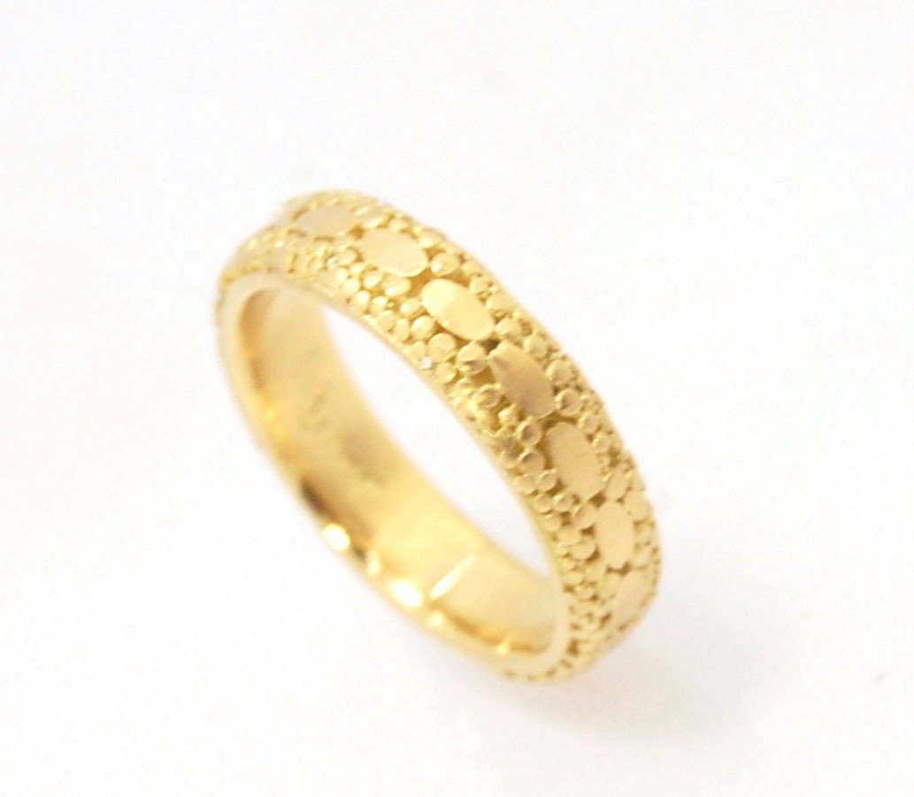 Oval Lace Granulation Ring in 18k Gold This is a stunning band I made from 18k Gold using the process of Granulation. I am happy to make one for you in your size. Each is one of a kind and handmade for you.Granulation is an ancient fusing process utilized