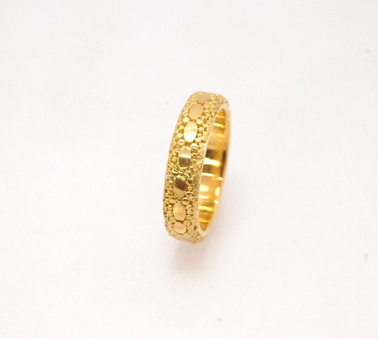 Oval Lace Granulation Ring in 18k Gold This is a stunning band I made from 18k Gold using the process of Granulation. I am happy to make one for you in your size. Each is one of a kind and handmade for you.Granulation is an ancient fusing process utilized