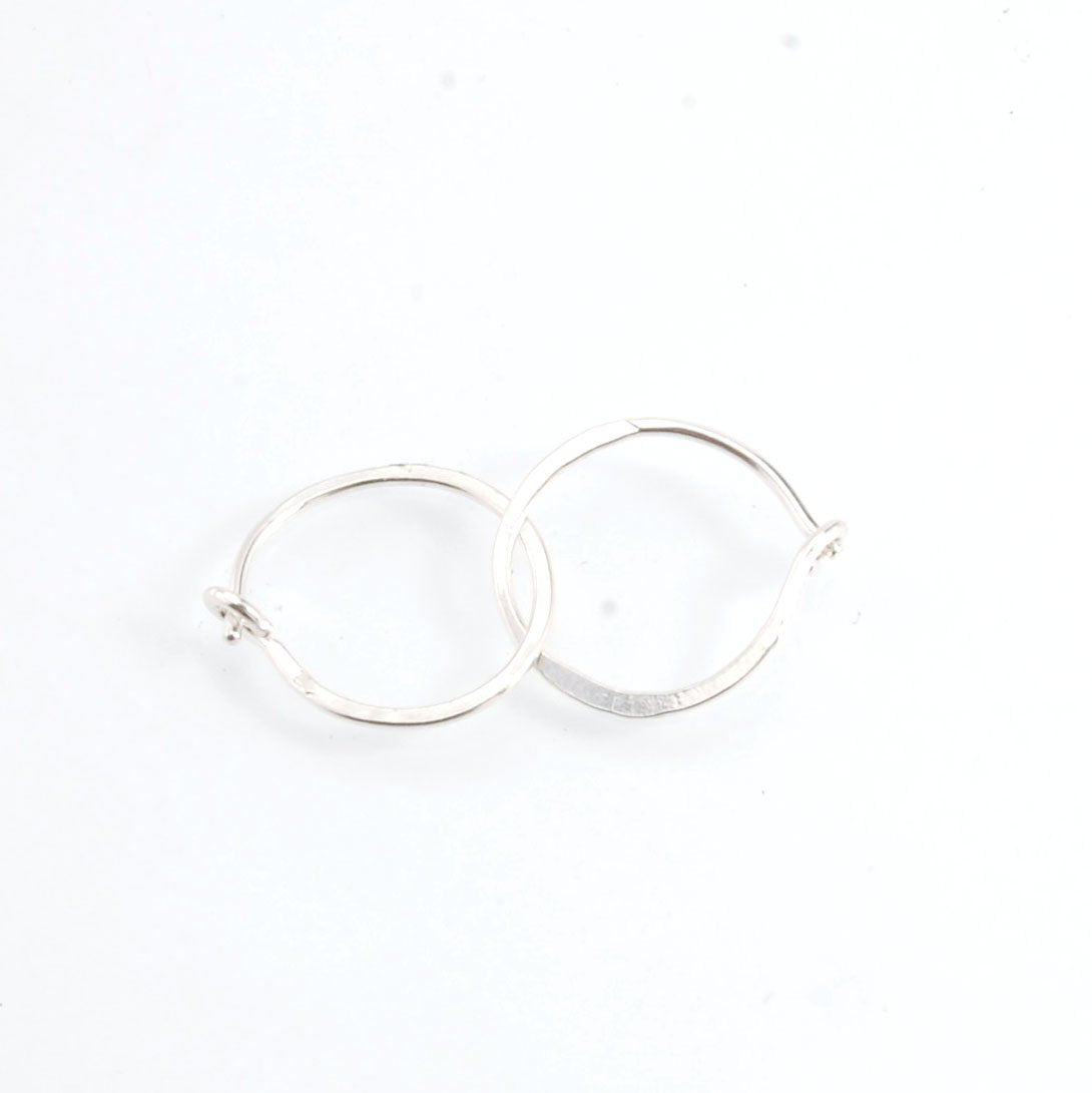 Hammered Hoops - Sterling - Small, Medium and Large Looking for an affordable handmade gift? Or some super lightweight Sterling Silver Hoops you can live in? These classic wire hammered hoops you can sleep and live in are forged from 20 gage Sterling wire