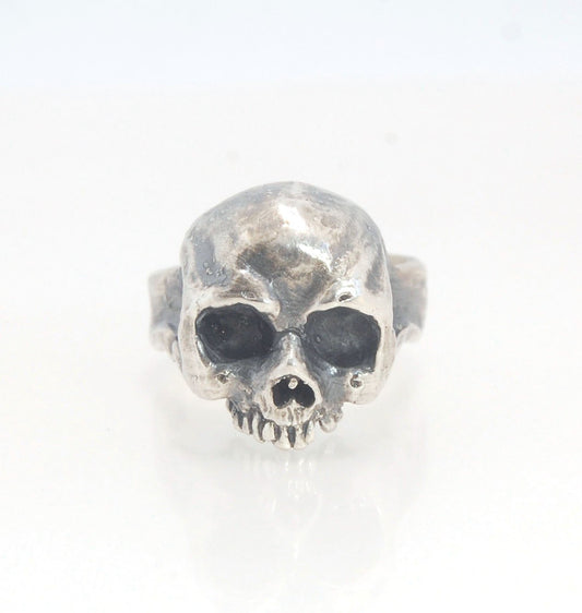 Solid Skull Ring in Sterling Silver This is a heavy, solid skull ring that is Made to Order for you in your size. You will probably not want to play pickleball or play the flute while wearing this heavy ring. Just saying. I carved this skull in wax and ca