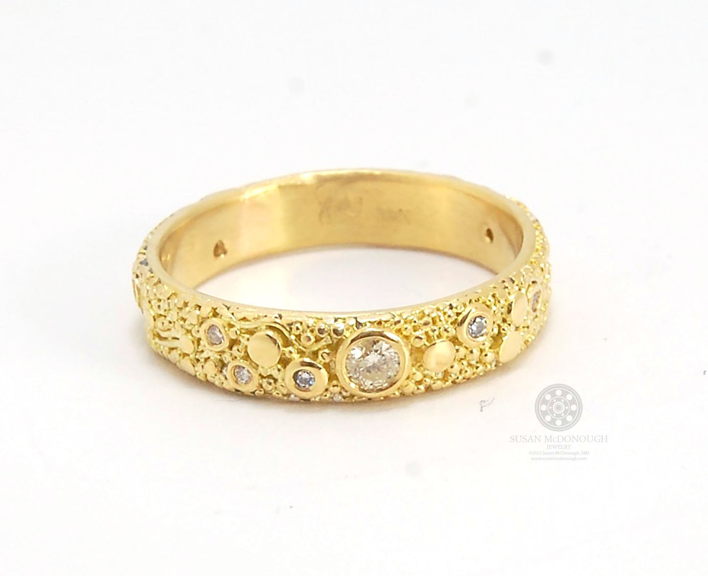 Balance and Flow Band 18k Granulation with 9 Diamonds - Made to Order This is a one-of-a-kind 18k gold and Diamond band made special just for you! The pattern is a balance of twining lines and granules and slices of cylinder ingots to make settings for ni