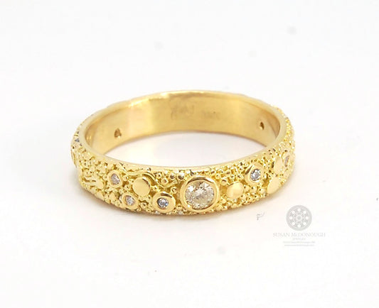 Balance and Flow Band 18k Granulation with 9 Diamonds - Made to Order This is a one-of-a-kind 18k gold and Diamond band made special just for you! The pattern is a balance of twining lines and granules and slices of cylinder ingots to make settings for ni