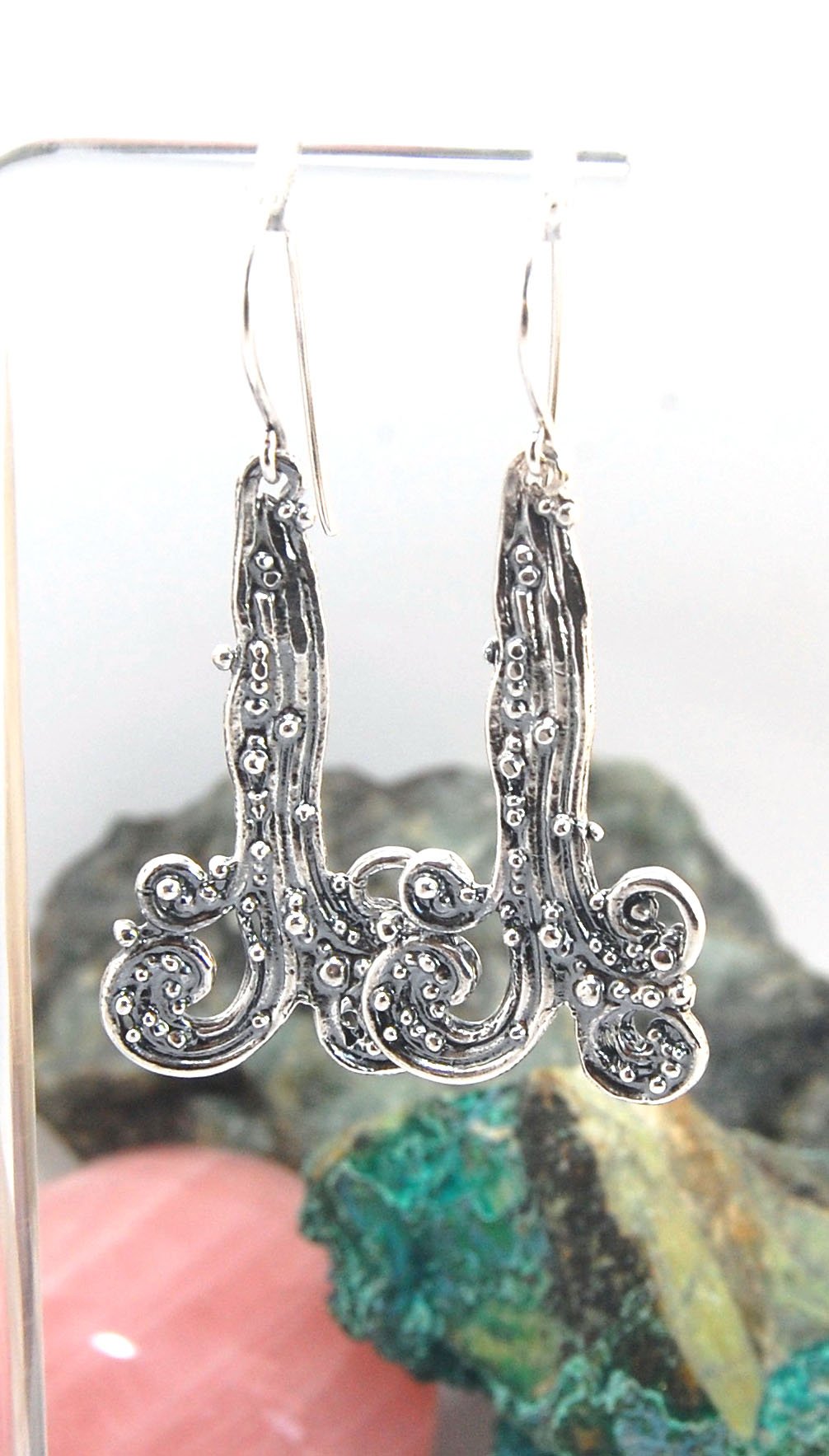 Waterfall Earrings These long Wave Dangles are part of my new work. These are cast versions of my original granulation work, which is then molded for repeat waxes and then cast using the Lost Wax process.These waterfall dangles have a dark patina and are