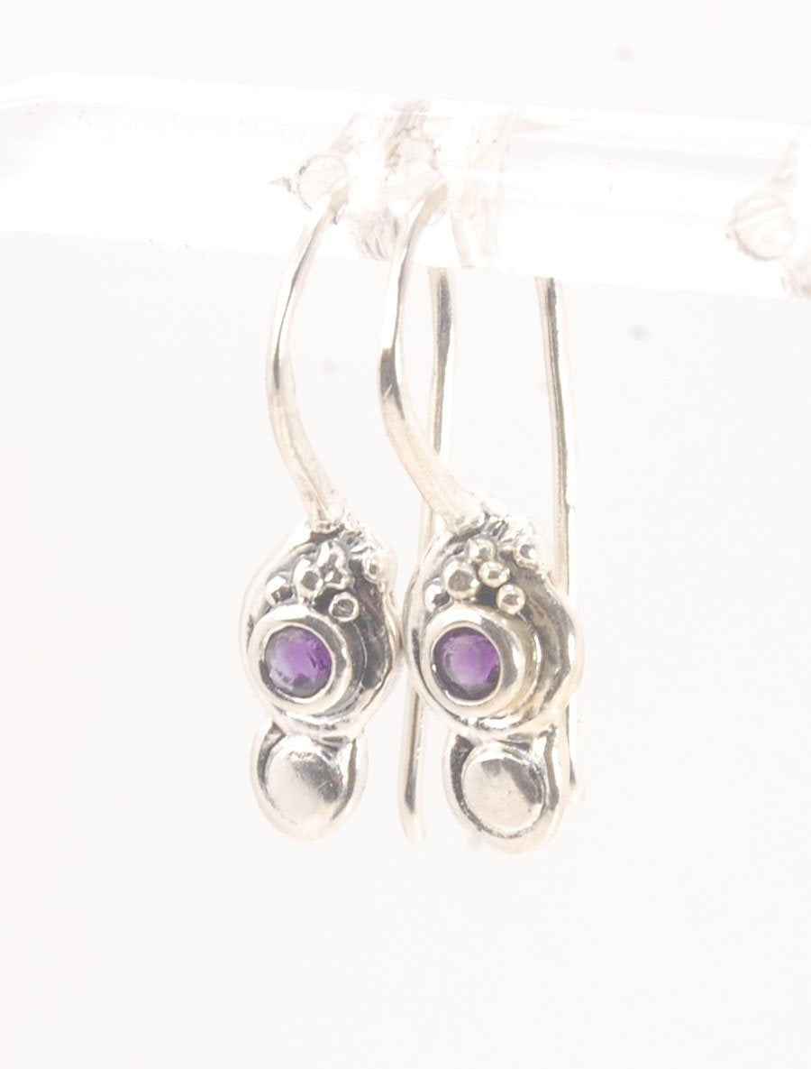 Wisteria Dangle Earrings in Amethyst, Garnet, or Topaz These delicate Wisteria earrings are cast in sterling silver from a Fine Silver granulated original. The have a fixed sterling french hook and can be set with amethyst faceted gem, garnet faceted gems