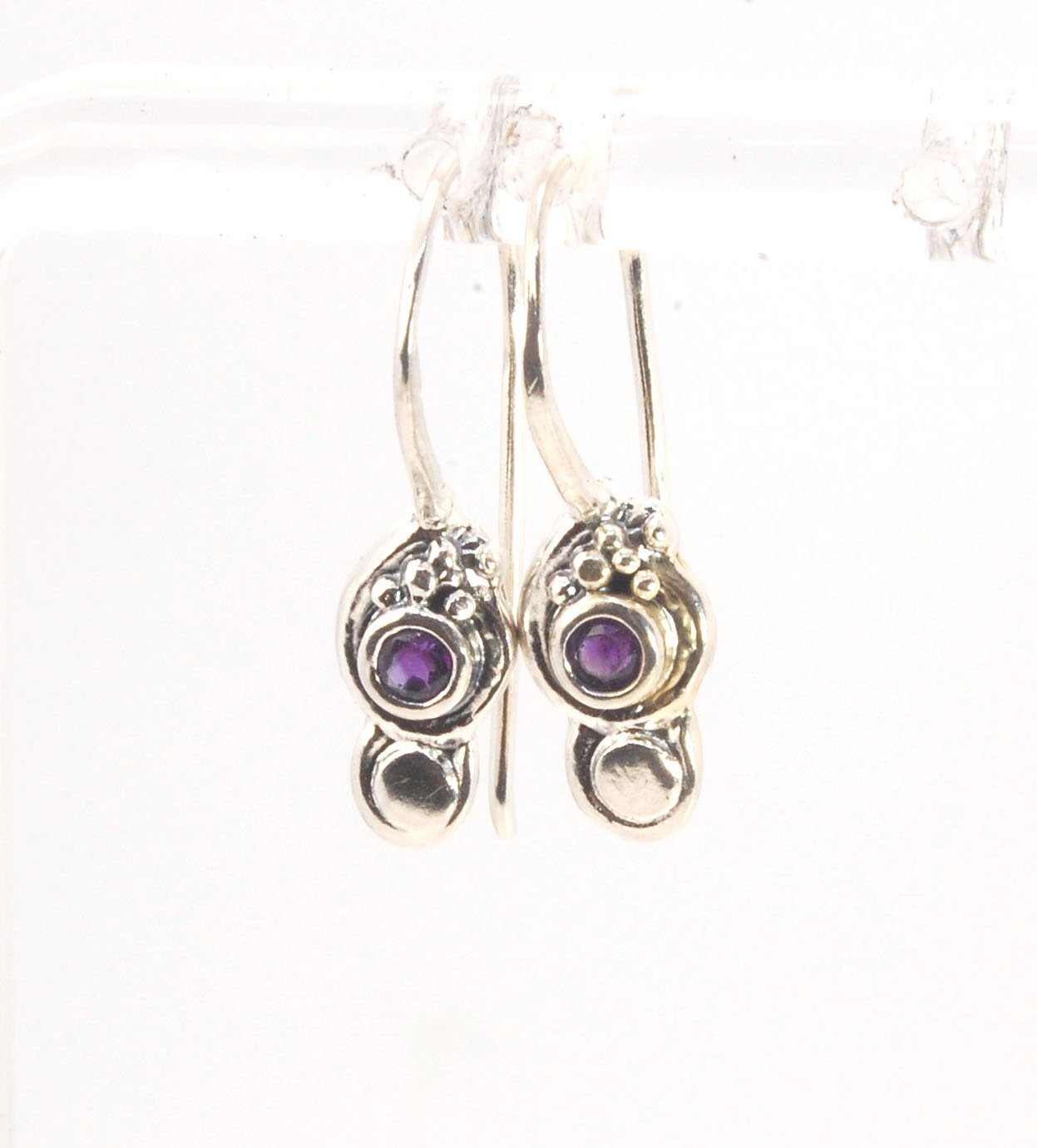 Wisteria Dangle Earrings in Amethyst, Garnet, or Topaz These delicate Wisteria earrings are cast in sterling silver from a Fine Silver granulated original. The have a fixed sterling french hook and can be set with amethyst faceted gem, garnet faceted gems