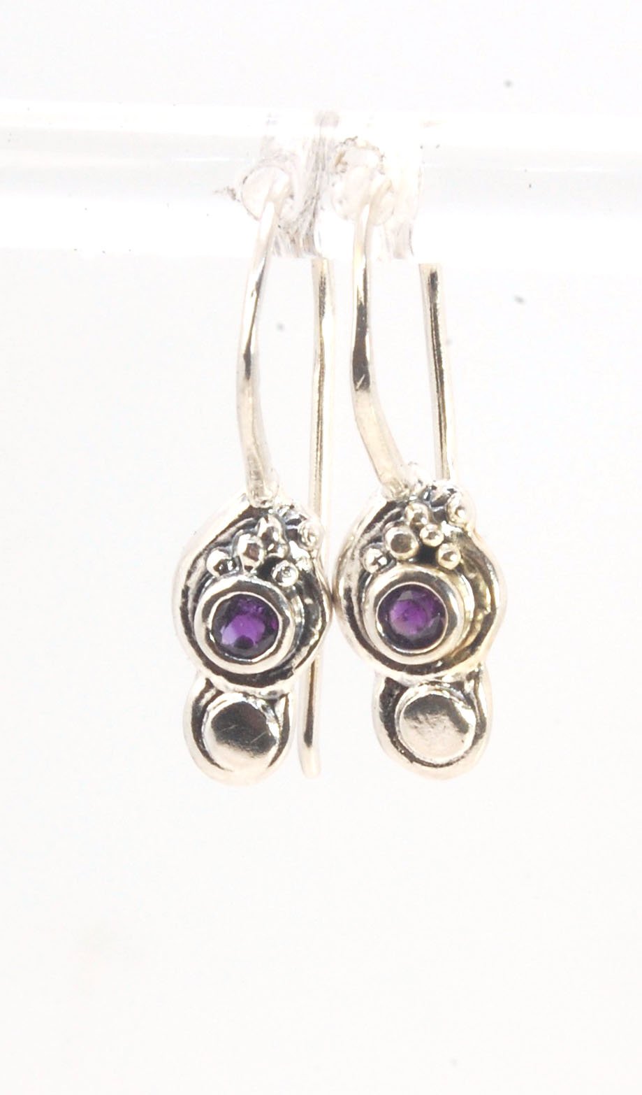 Wisteria Dangle Earrings in Amethyst, Garnet, or Topaz These delicate Wisteria earrings are cast in sterling silver from a Fine Silver granulated original. The have a fixed sterling french hook and can be set with amethyst faceted gem, garnet faceted gems