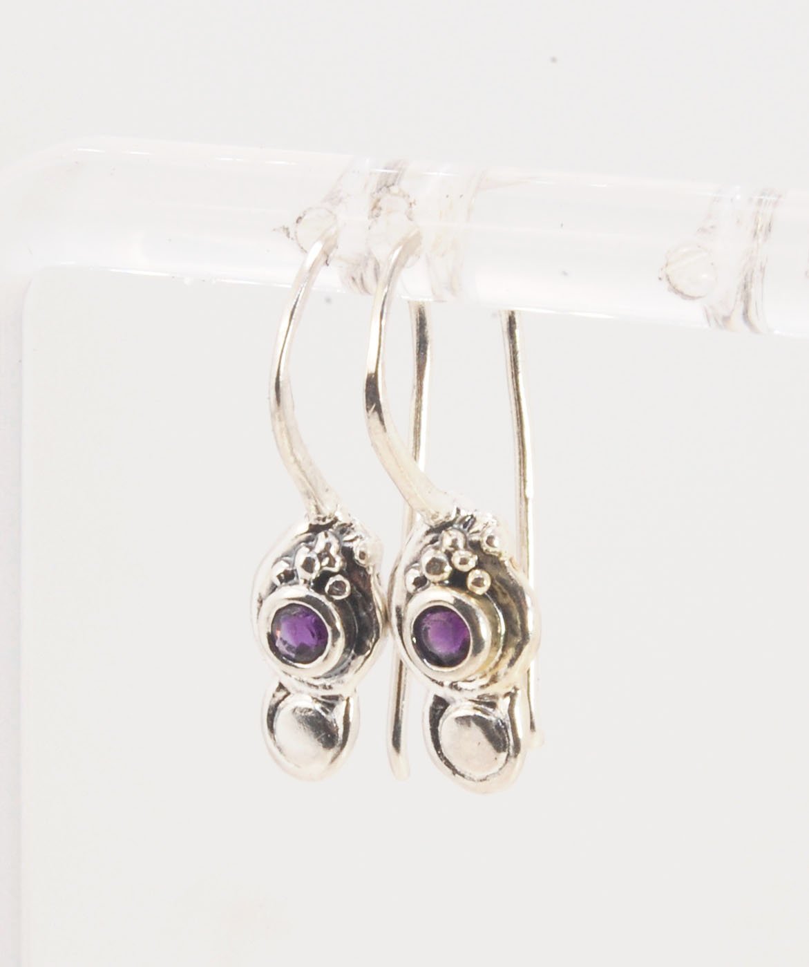 Wisteria Dangle Earrings in Amethyst, Garnet, or Topaz These delicate Wisteria earrings are cast in sterling silver from a Fine Silver granulated original. The have a fixed sterling french hook and can be set with amethyst faceted gem, garnet faceted gems