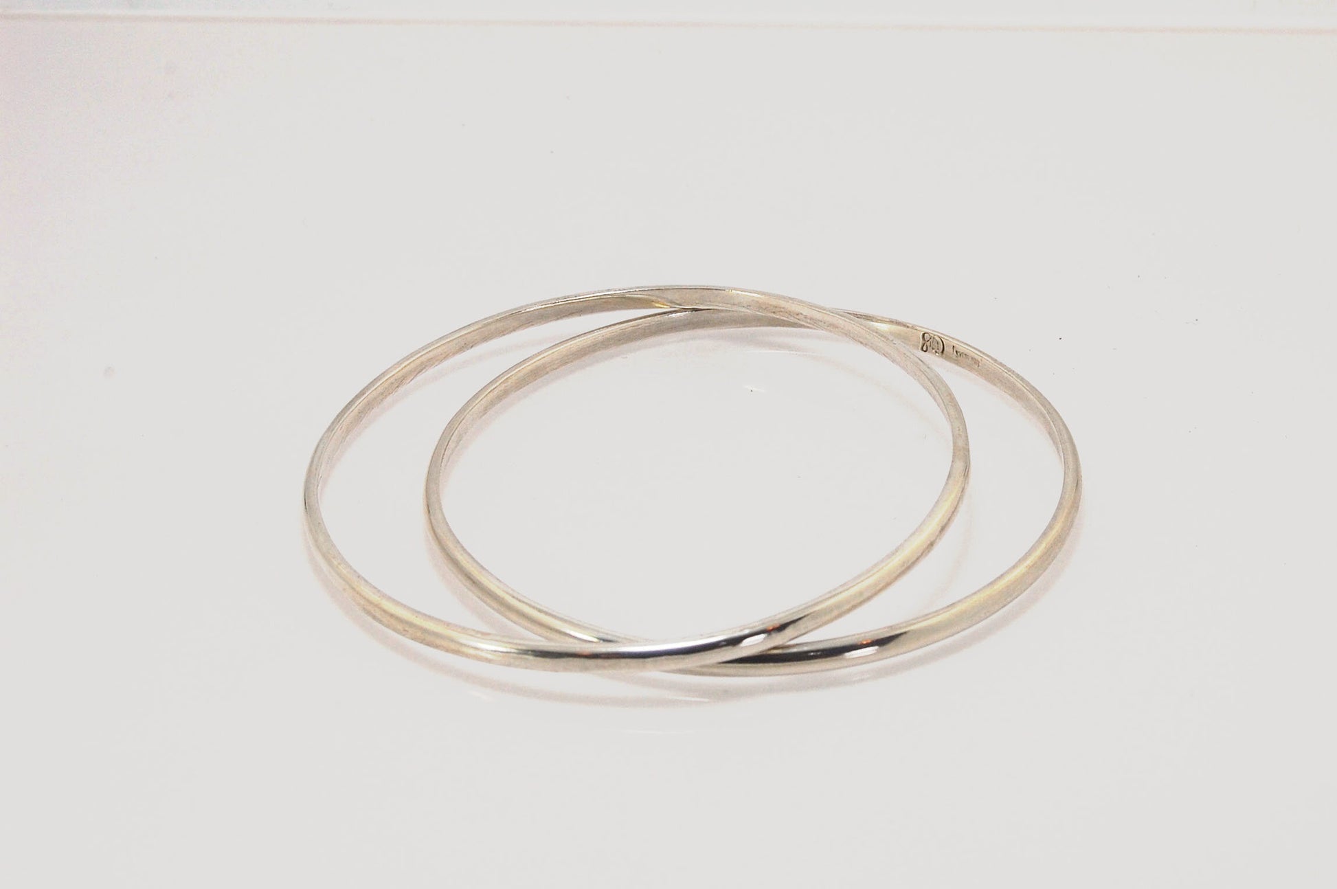 3mm Half Round Sterling Silver Bangles Who doesn’t love a good bangle stack! These bangles are available in 2 finishes. Shiny or Matte.Handmade by me in my studio, I pour a large ingot of sterling silver and roll it out into a half round shape and cut to