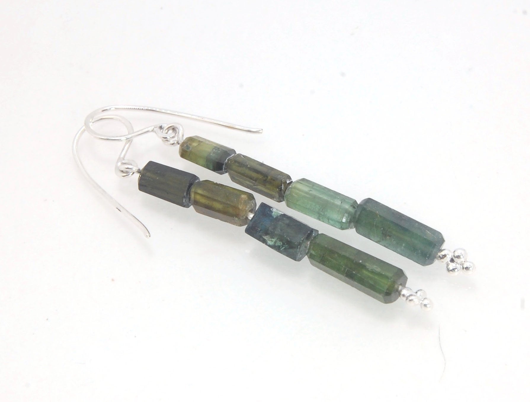 Green Blue Tourmaline Crystal Dangle Earrings in Silver Blue Green Tourmaline 5 Stone Crystal Dangles in Fine Silver and Sterling Silver gold with French hooks I just love blue-green tourmaline! These stones have a lovely, translucent blue-green color and