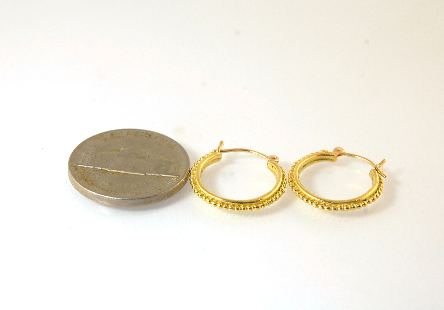 Light Etruscan Hoops in 14k gold - 15mm - lightweight These 14k yellow gold hoops are cast in my studio (actually on the deck as casting needs good ventilation) from a granulated master for a limited edition series of hoops. I use fine silver for the orig