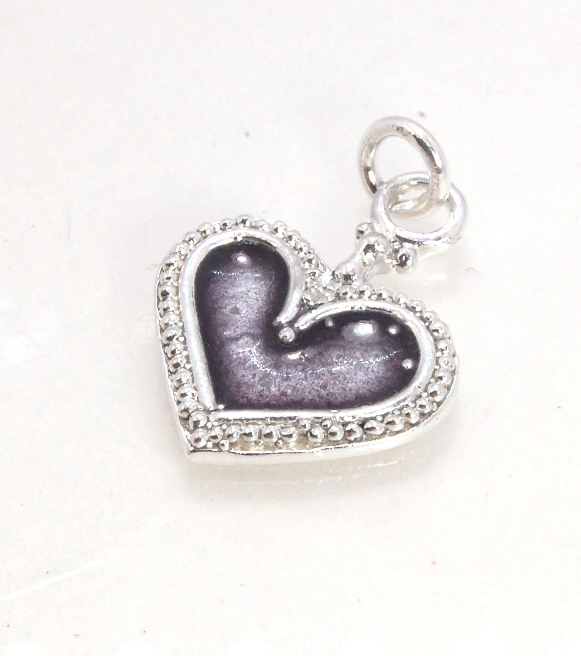 Enamel Heart Charm in Fine SIlver It’s a HEART of fine silver granulation that I made a mold of, then cast, then enameled! In your choice of colors: Red, Purple, Green, Black, Azalea, HollyhockGranulation is an ancient fusing process utilized for thousand