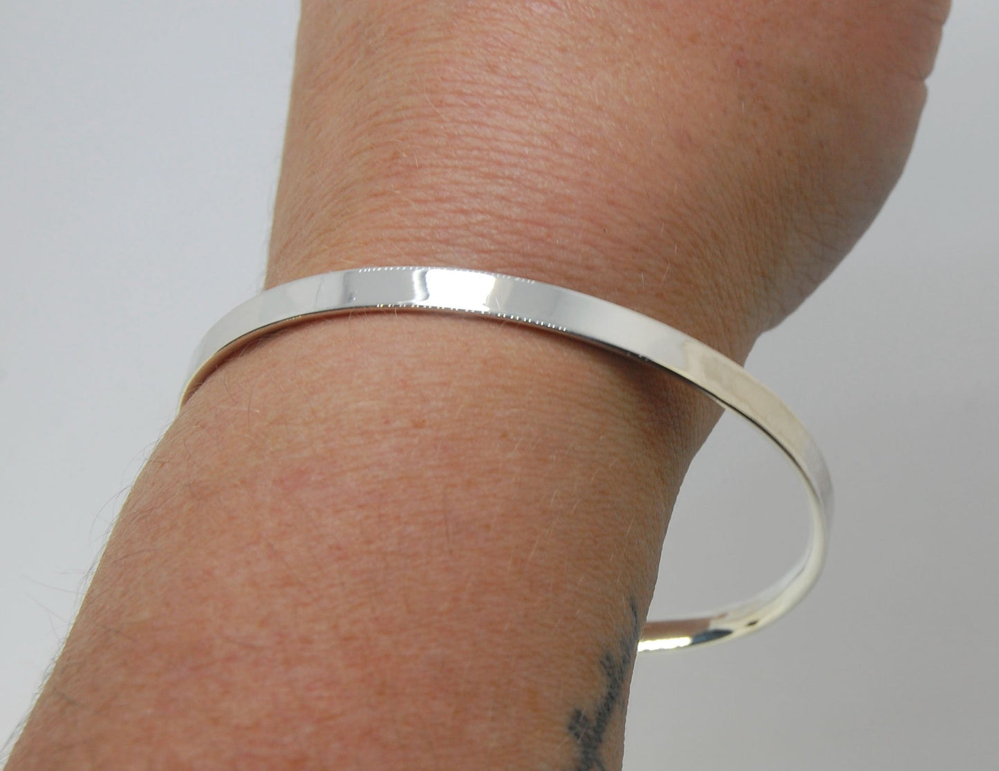 5mm Inverted Half Round Sterling Silver Bangles Who doesn’t love a good bangle stack! These comfortable inverted half round bangles are available in 2 finishes. Shiny or Matte.Handmade by me in my studio, I pour a large ingot of sterling silver and roll i