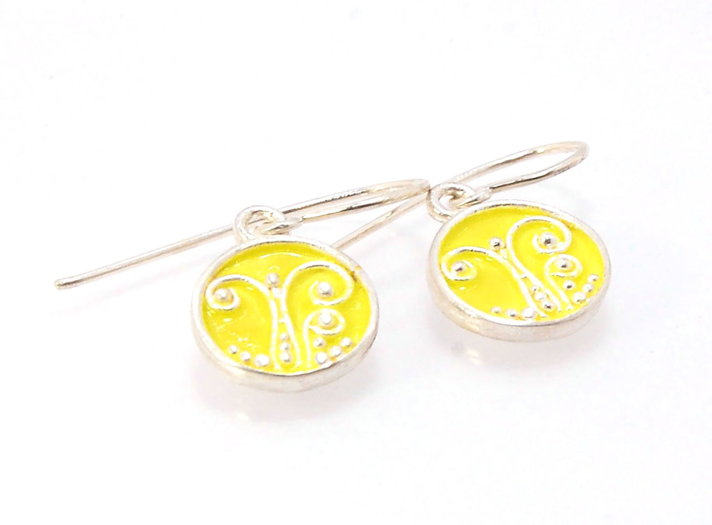 Daffodil Yellow Enameled Sterling Fern Circle Earrings - 12mm cast granulation,Enameled,Enameled earrings,fine silver granulation,silver,Yellow These small silver earrings are enameled in a bright pale yellow! These are cast from a wax mold of a granulate