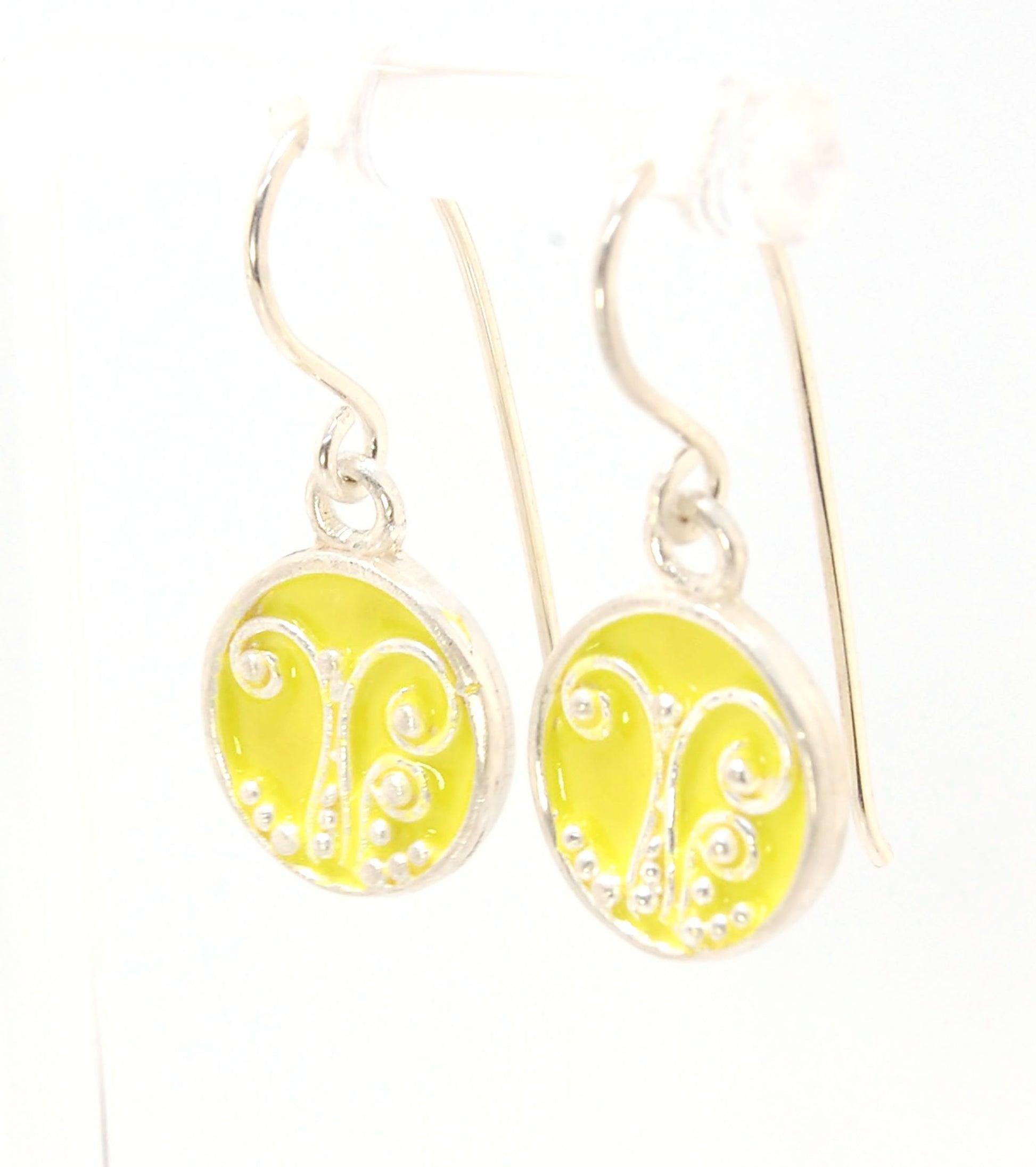 Daffodil Yellow Enameled Sterling Fern Circle Earrings - 12mm cast granulation,Enameled,Enameled earrings,fine silver granulation,silver,Yellow These small silver earrings are enameled in a bright pale yellow! These are cast from a wax mold of a granulate