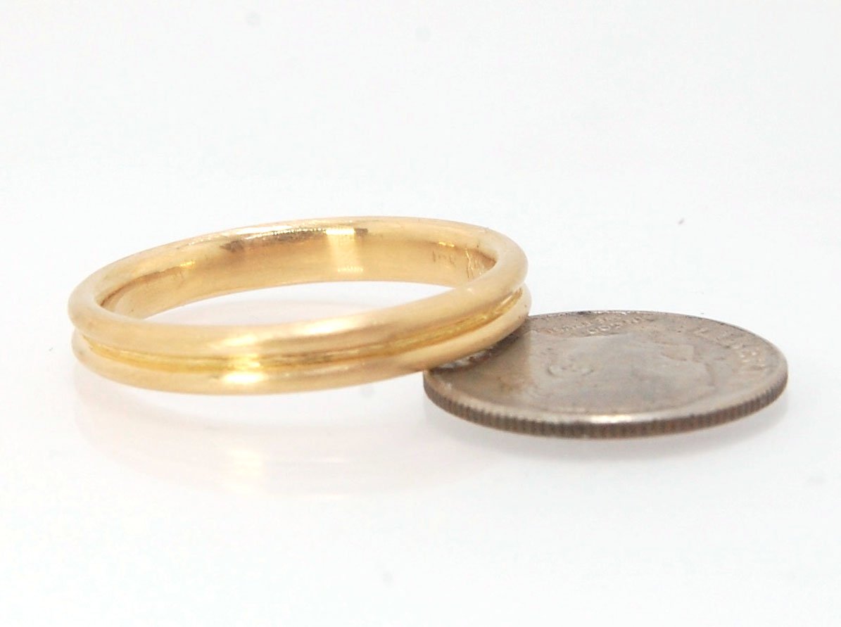 2 Rim 3.3mm Wide Band - Sterling silver, 14k or 18k yellow gold This is a narrow, 3.3mm, 2 rim band cast from a wax carving turned on a lathe. These are so much fun to make and I have several variations of different rims and widths available. I then take