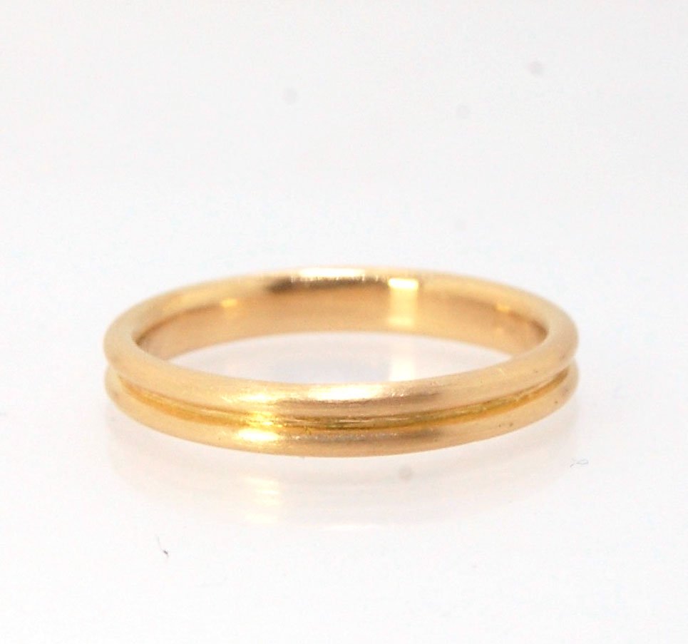 2 Rim 3.3mm Wide Band - Sterling silver, 14k or 18k yellow gold This is a narrow, 3.3mm, 2 rim band cast from a wax carving turned on a lathe. These are so much fun to make and I have several variations of different rims and widths available. I then take