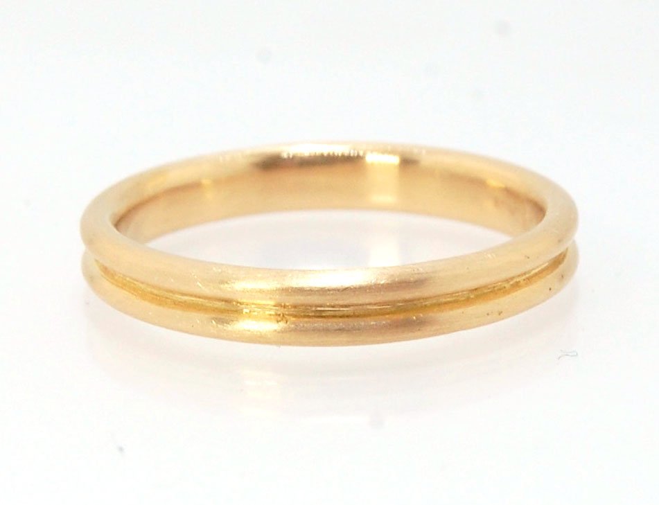 2 Rim 3.3mm Wide Band - Sterling silver, 14k or 18k yellow gold This is a narrow, 3.3mm, 2 rim band cast from a wax carving turned on a lathe. These are so much fun to make and I have several variations of different rims and widths available. I then take