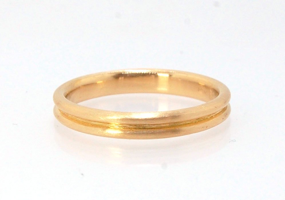 2 Rim 3.3mm Wide Band - Sterling silver, 14k or 18k yellow gold This is a narrow, 3.3mm, 2 rim band cast from a wax carving turned on a lathe. These are so much fun to make and I have several variations of different rims and widths available. I then take