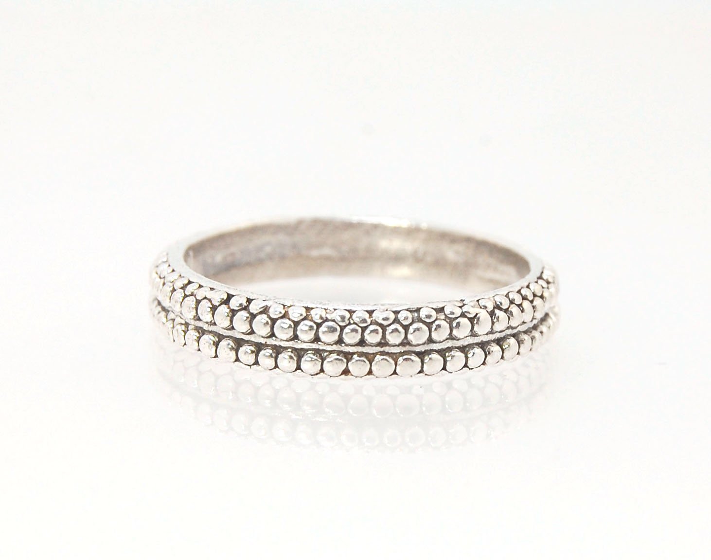 Double Row Granulation Band - Cast in Sterling Silver This is cast from a granulated original and is pictured here in Sterling Silver, but I can also cast this in 14k or 18k yellow gold. Or would be happy to make a similar design for you in original 18k g