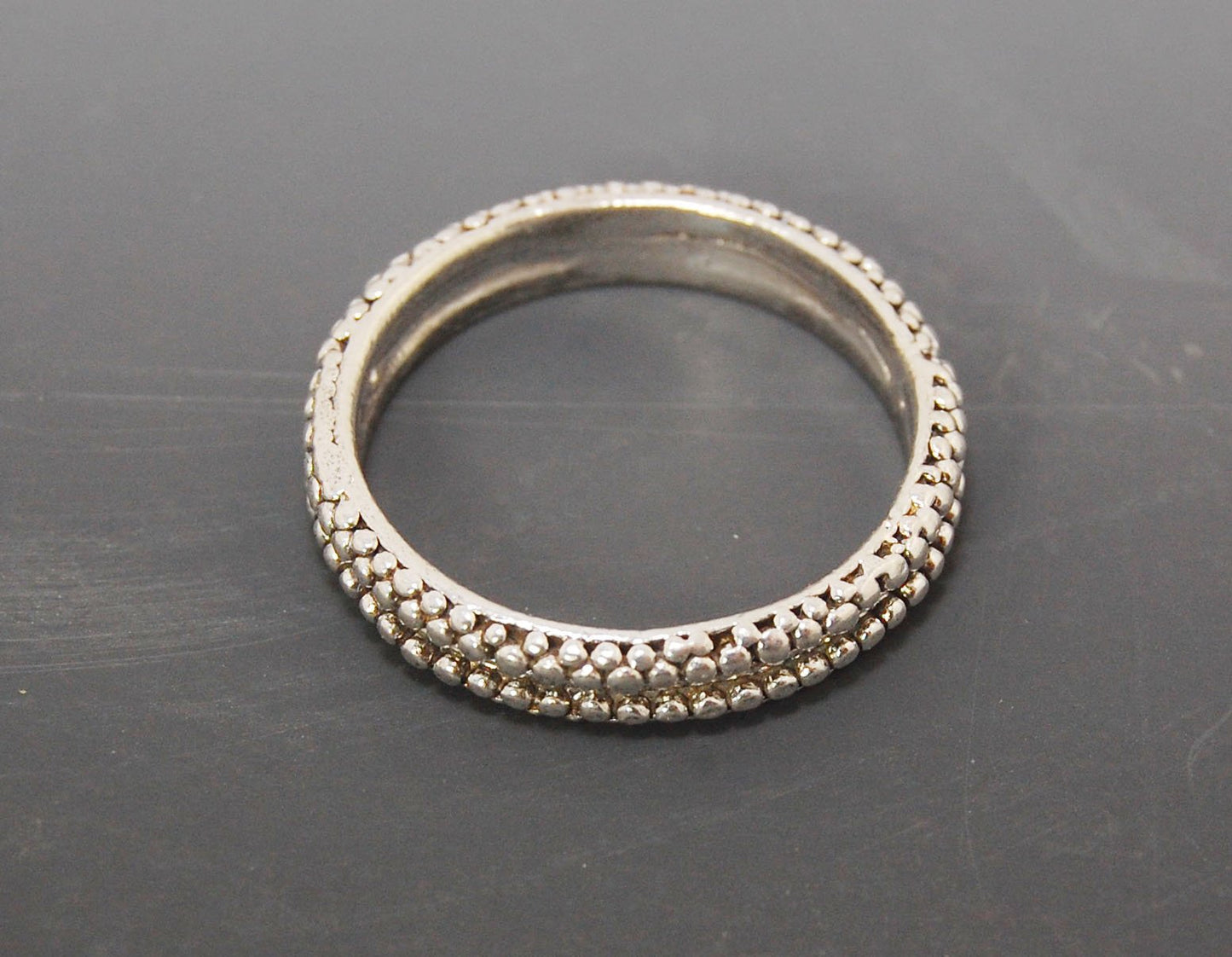 Double Row Granulation Band - Cast in Sterling Silver This is cast from a granulated original and is pictured here in Sterling Silver, but I can also cast this in 14k or 18k yellow gold. Or would be happy to make a similar design for you in original 18k g