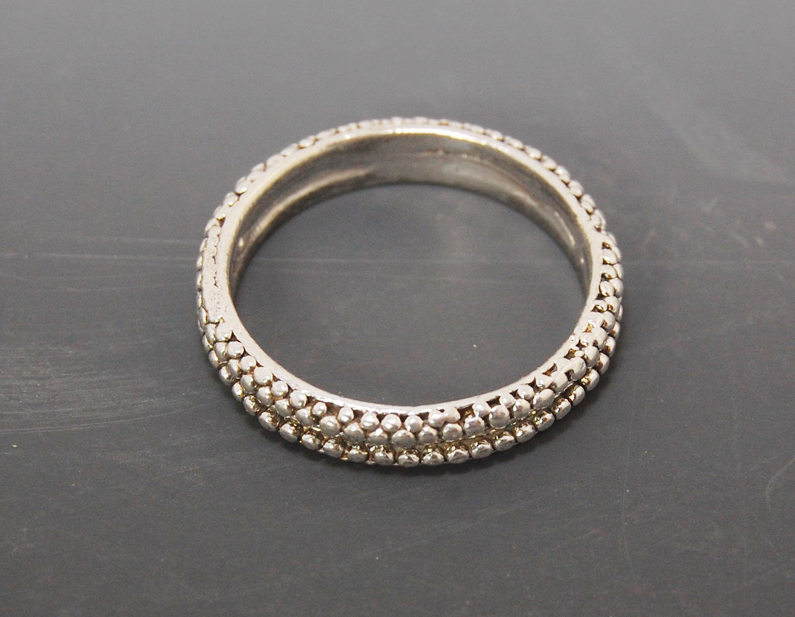 Double Row Granulation Band - Cast in Sterling Silver This is cast from a granulated original and is pictured here in Sterling Silver, but I can also cast this in 14k or 18k yellow gold. Or would be happy to make a similar design for you in original 18k g