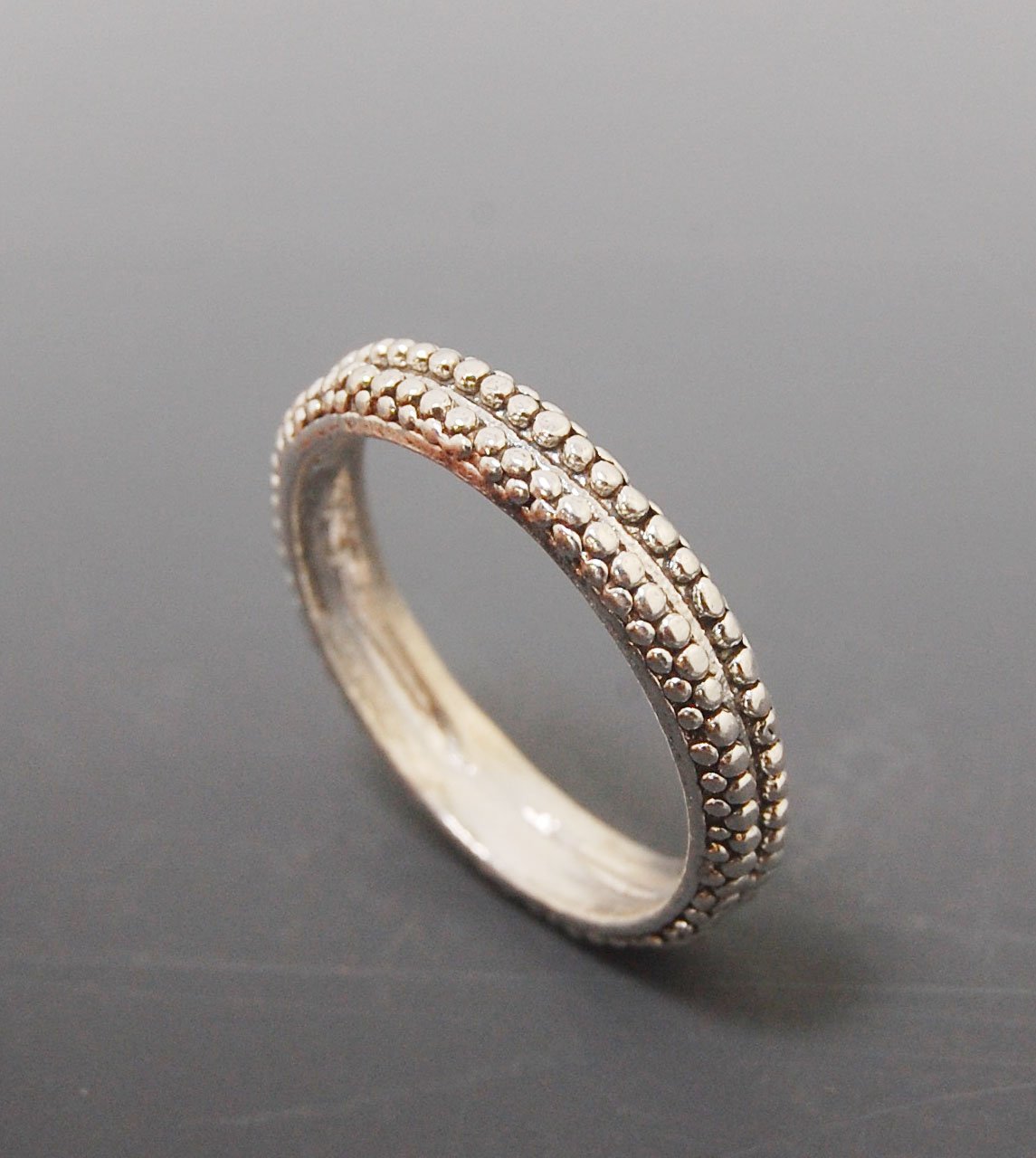 Double Row Granulation Band - Cast in Sterling Silver This is cast from a granulated original and is pictured here in Sterling Silver, but I can also cast this in 14k or 18k yellow gold. Or would be happy to make a similar design for you in original 18k g