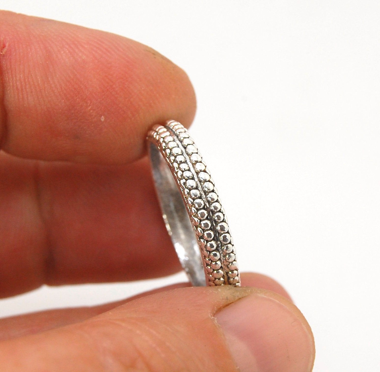 Double Row Granulation Band - Cast in Sterling Silver This is cast from a granulated original and is pictured here in Sterling Silver, but I can also cast this in 14k or 18k yellow gold. Or would be happy to make a similar design for you in original 18k g