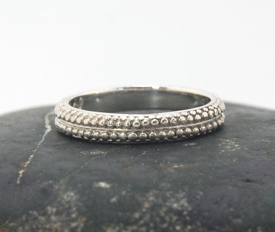 Double Row Granulation Band - Cast in Sterling Silver This is cast from a granulated original and is pictured here in Sterling Silver, but I can also cast this in 14k or 18k yellow gold. Or would be happy to make a similar design for you in original 18k g