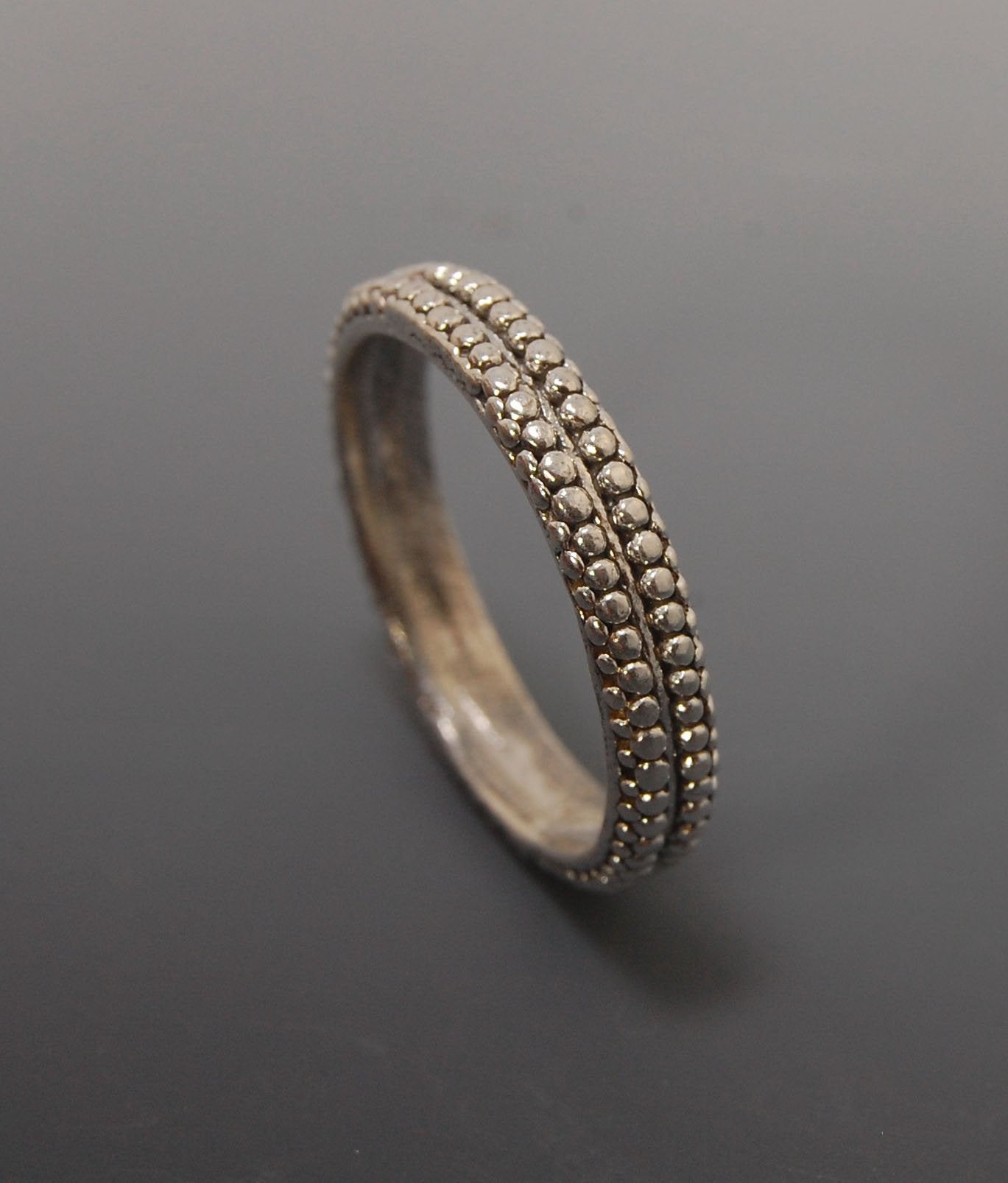 Double Row Granulation Band - Cast in Sterling Silver This is cast from a granulated original and is pictured here in Sterling Silver, but I can also cast this in 14k or 18k yellow gold. Or would be happy to make a similar design for you in original 18k g