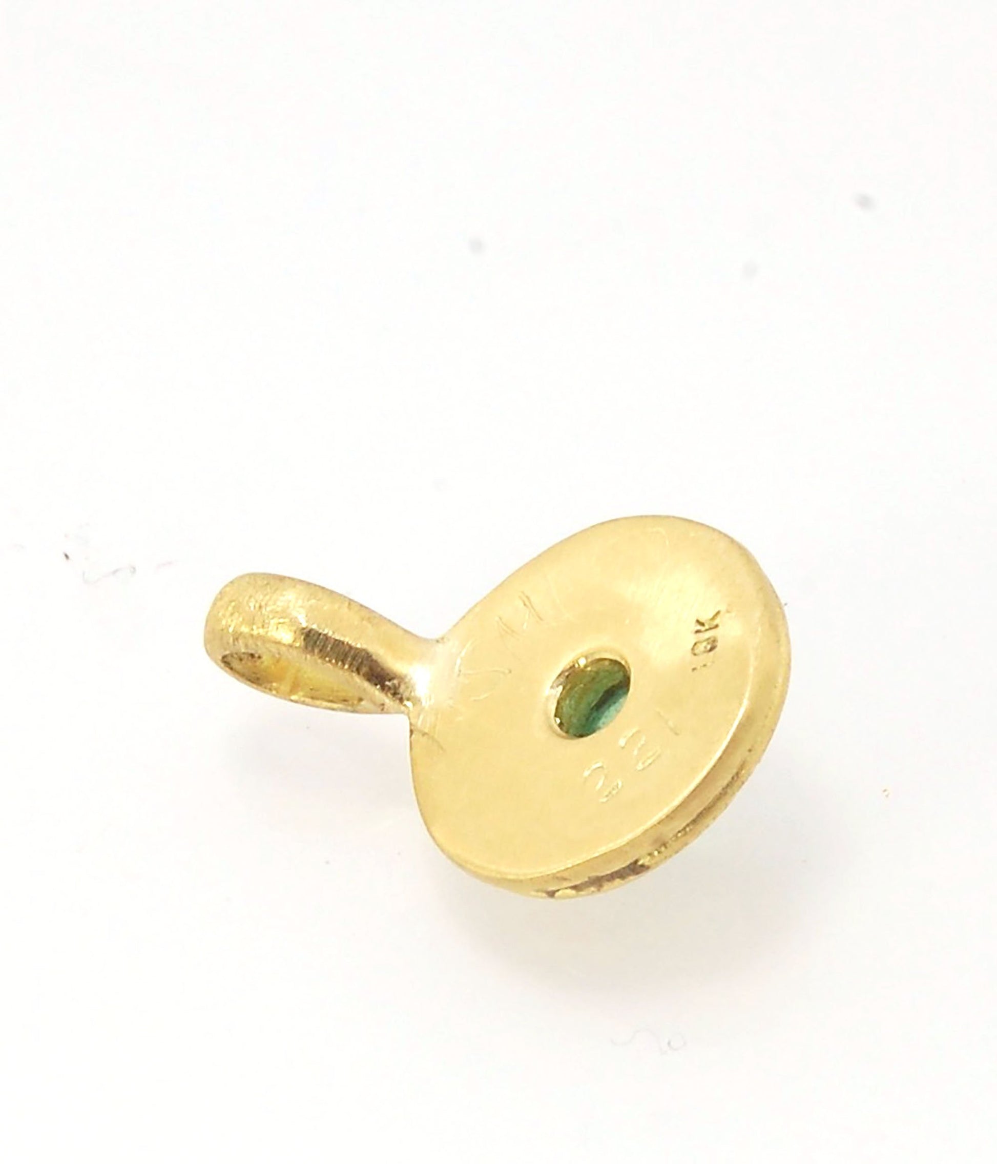 Emerald Cabochon 22k gold Tiny Granulated Disk Pendant The sweetest tiny emerald pendant yet!This lovely, luminous, ethically sourced emerald is bezel-set in 18k rich yellow gold granulation on 18k gold. Granulation is an ancient fusing process utilized f