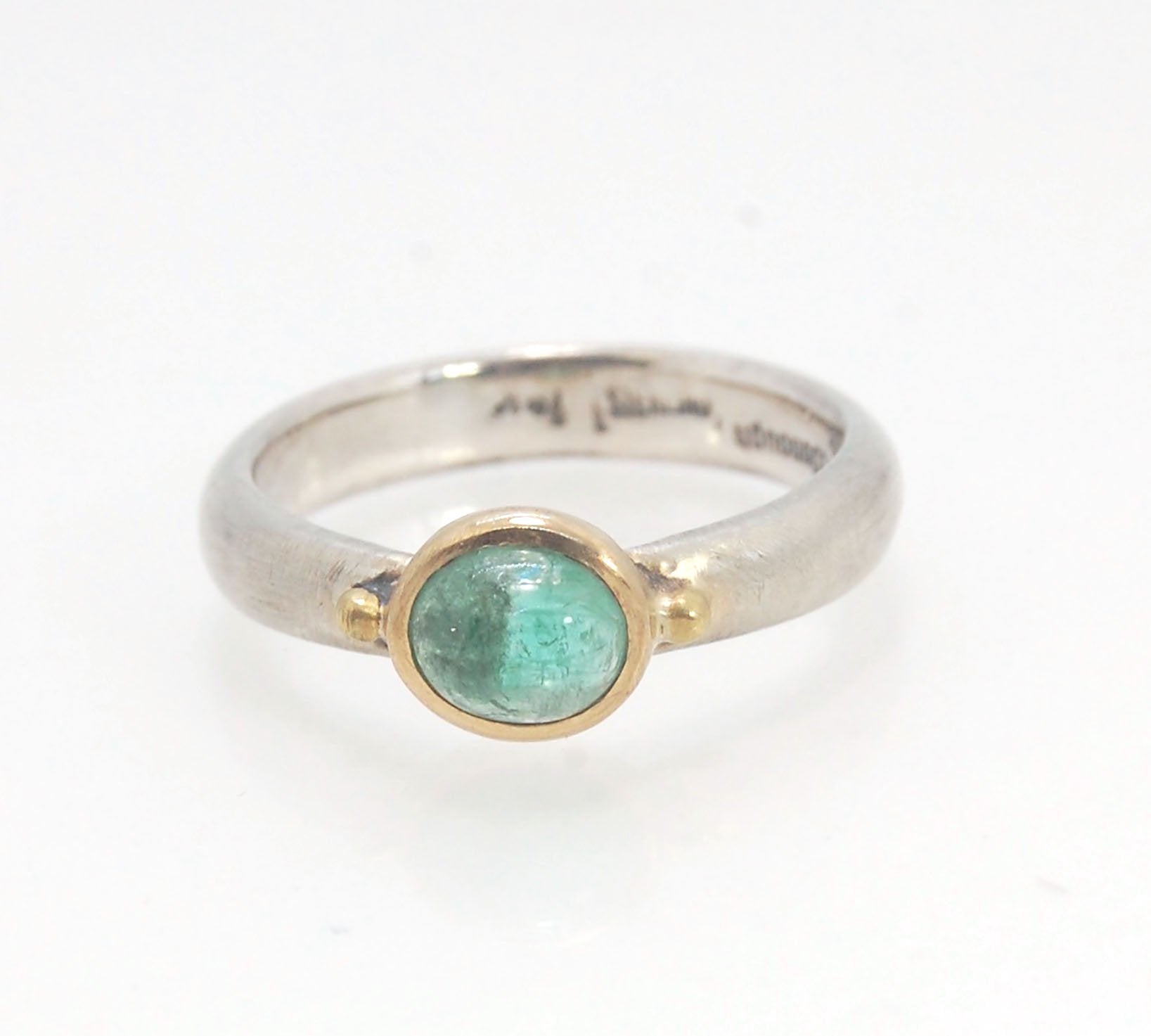 Emerald Bi Metal Freckle Ring - 14k and Sterling Silver - Size 8 This is a unique emerald cabochon with a darker freckle included in the lighter-colored emerald! This emerald cabochon is bezel-set in 14k gold with large gold granules on the Sterling Silve